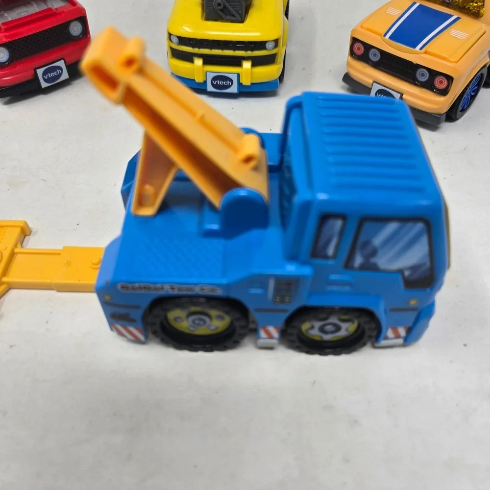 VTech Go Go Smart Wheels Vehicle Lot Tow Truck Race Car Hot Rod 4 Piece Set